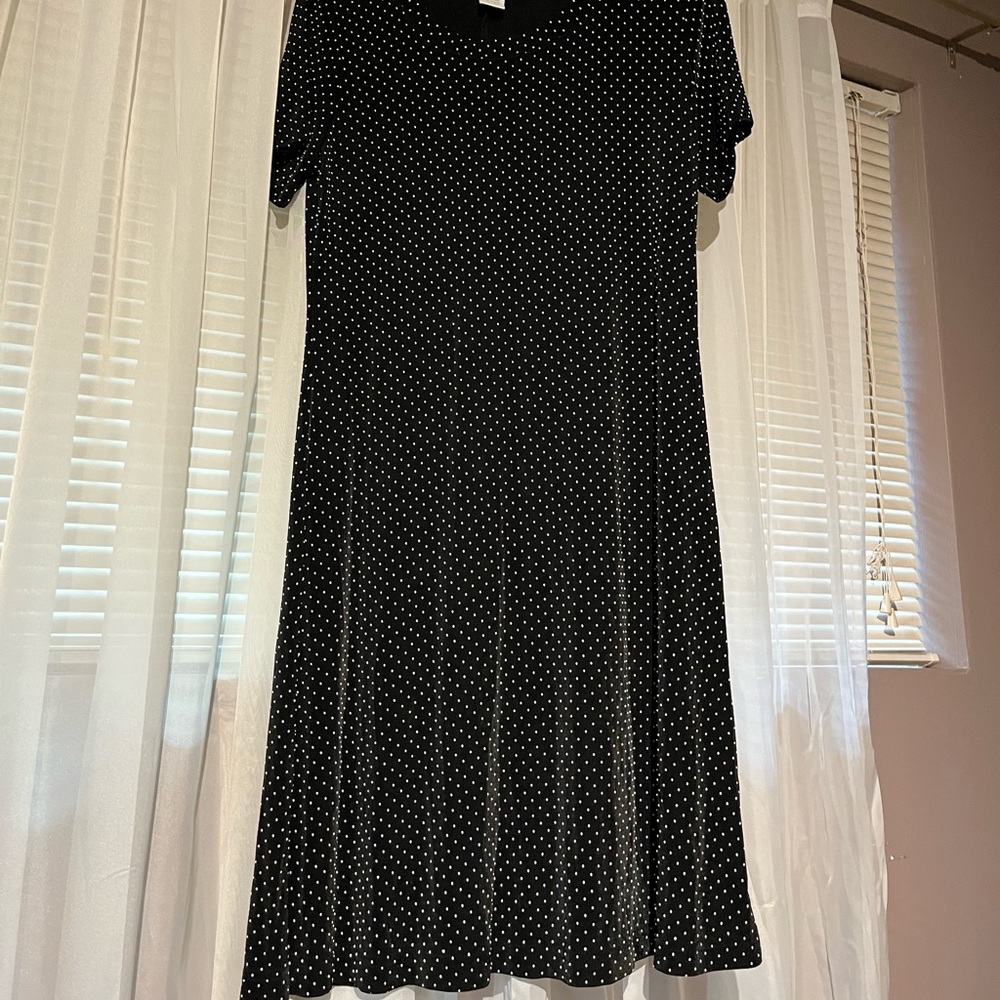 Black slinky dress with white polka dots